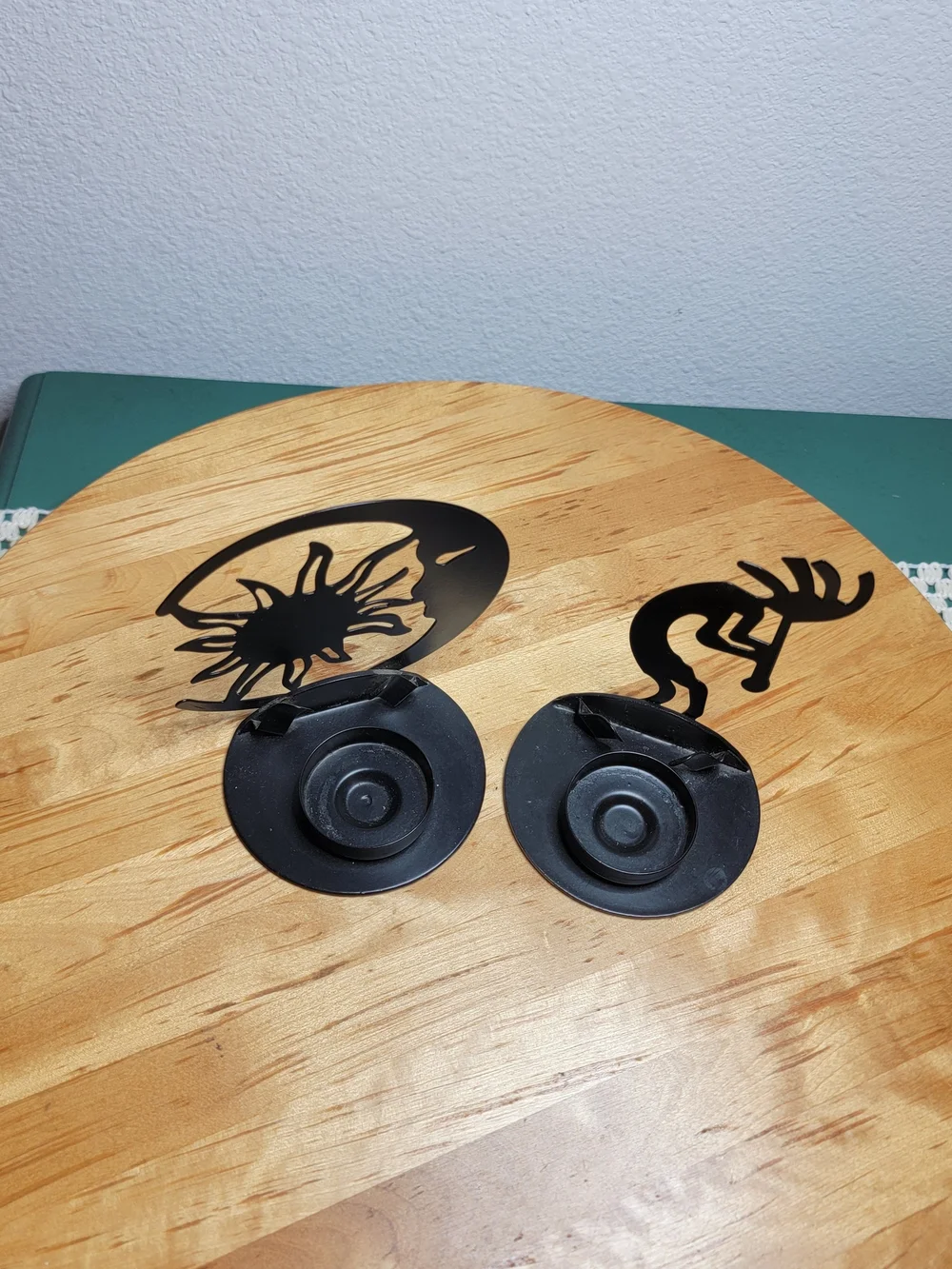 The Southwest Kokopelli Decorative Cast Iron Candle Holders are handmade in the